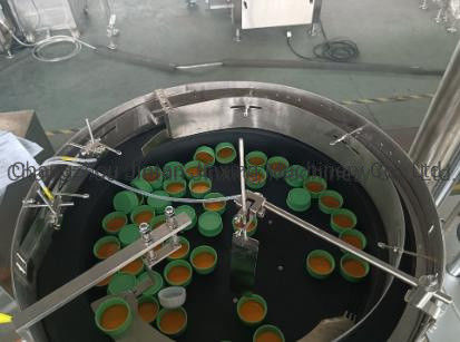 Produits de soins capillaires bouteille ronde Machine de fermeture linéaire entièrement automatique